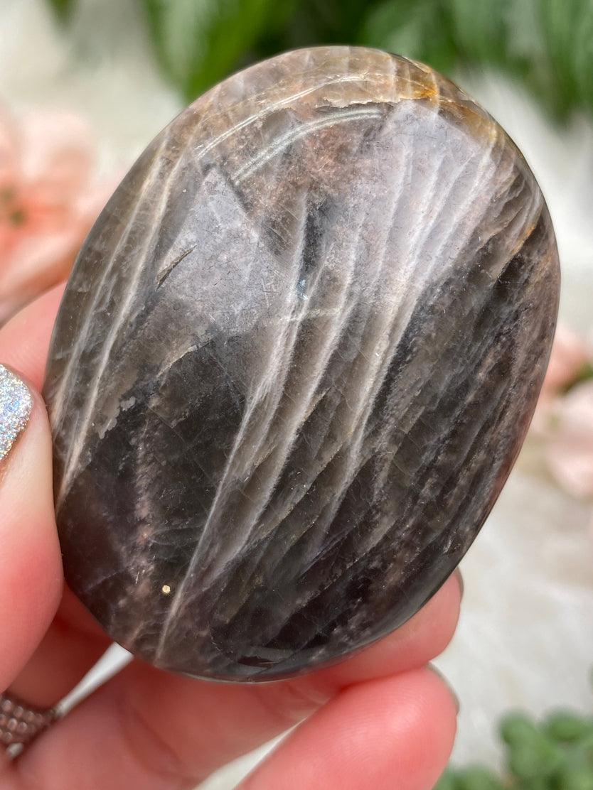 brown-moonstone-palm-stone-with-flash