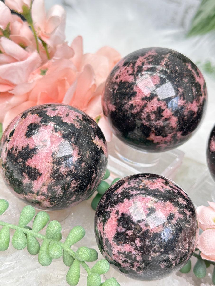 black-pink-rhodonite-spheres-from-madagascar