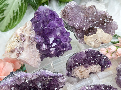 calcite-on-amethyst-clusters