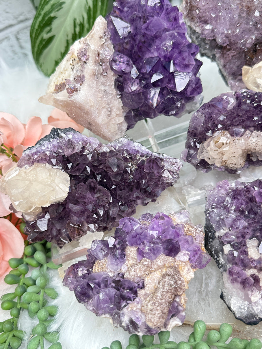 calcite-on-amethyst-clusters