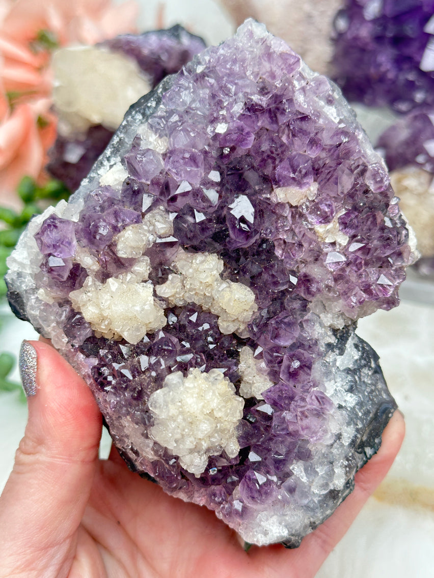 unique-calcite-on-amethyst-cluster