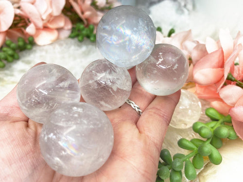 Small-Clear-Optical-Calcite-Crystal-Spheres-with-Rainbows