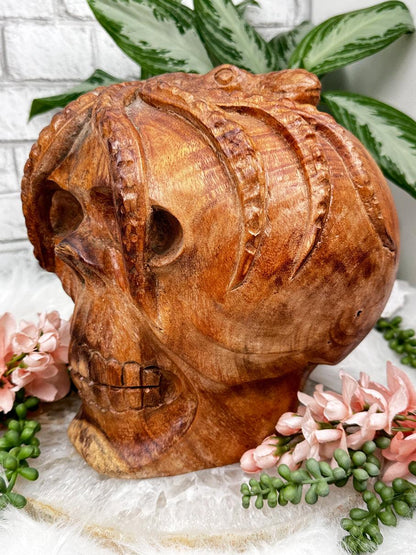 carved-wood-skull-with-octopus