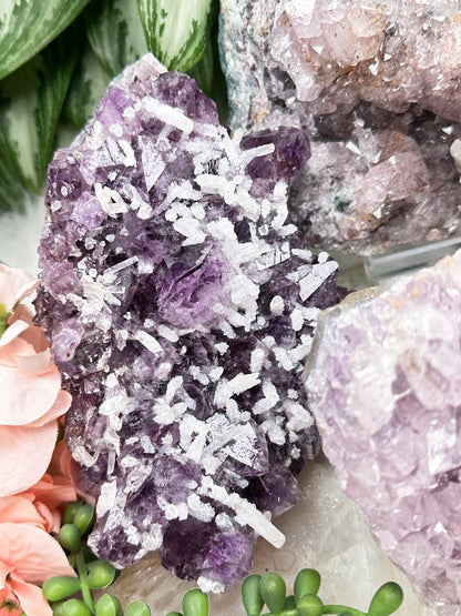 druzy-calcite-on-amethyst-cluster