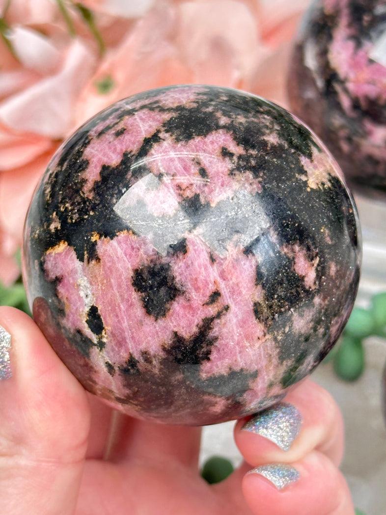 pink-black-rhodonite-sphere