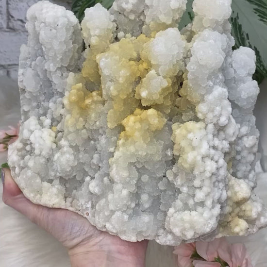 Large white apophyllite chalcedony crystal cluster with yellow iron video