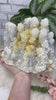 Large white apophyllite chalcedony crystal cluster with yellow iron video