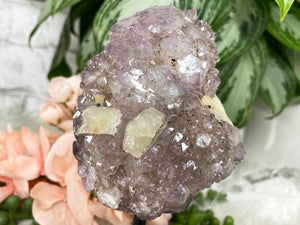 Contempo Crystals - Quality Brazilian amethyst crystal that has actually grown over calcite.  The face also has pieces of calcite showing.  This piece is on a black metal stand (cannot come off).  Very unique piece due to the amethyst growing on the calcite! - Image 2