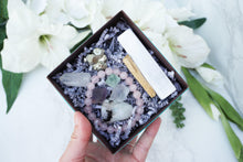 Load image into Gallery: Contempo Crystals - Close up of Crystal Gift Set with Rose Quartz Bracelet, Selenite, Fluorite Octahedrons, Moonstone Tumble, Pyritte Chunk, Quartz Point and a Palo Santo Stickelf-Love-Crystal-Gift-Set-with-Rose-Quartz-Bracelet-Moonstone - Image 4