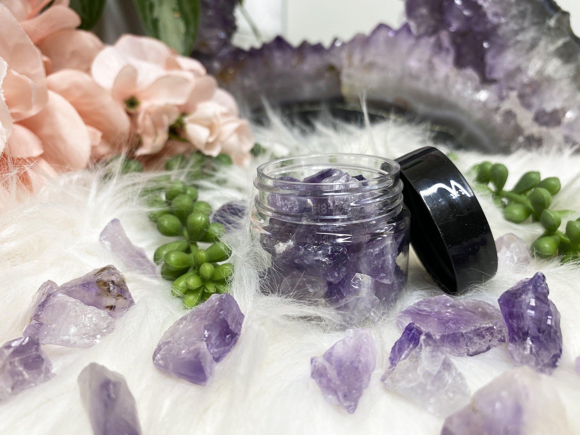 An adorable jar of amethyst points and pieces