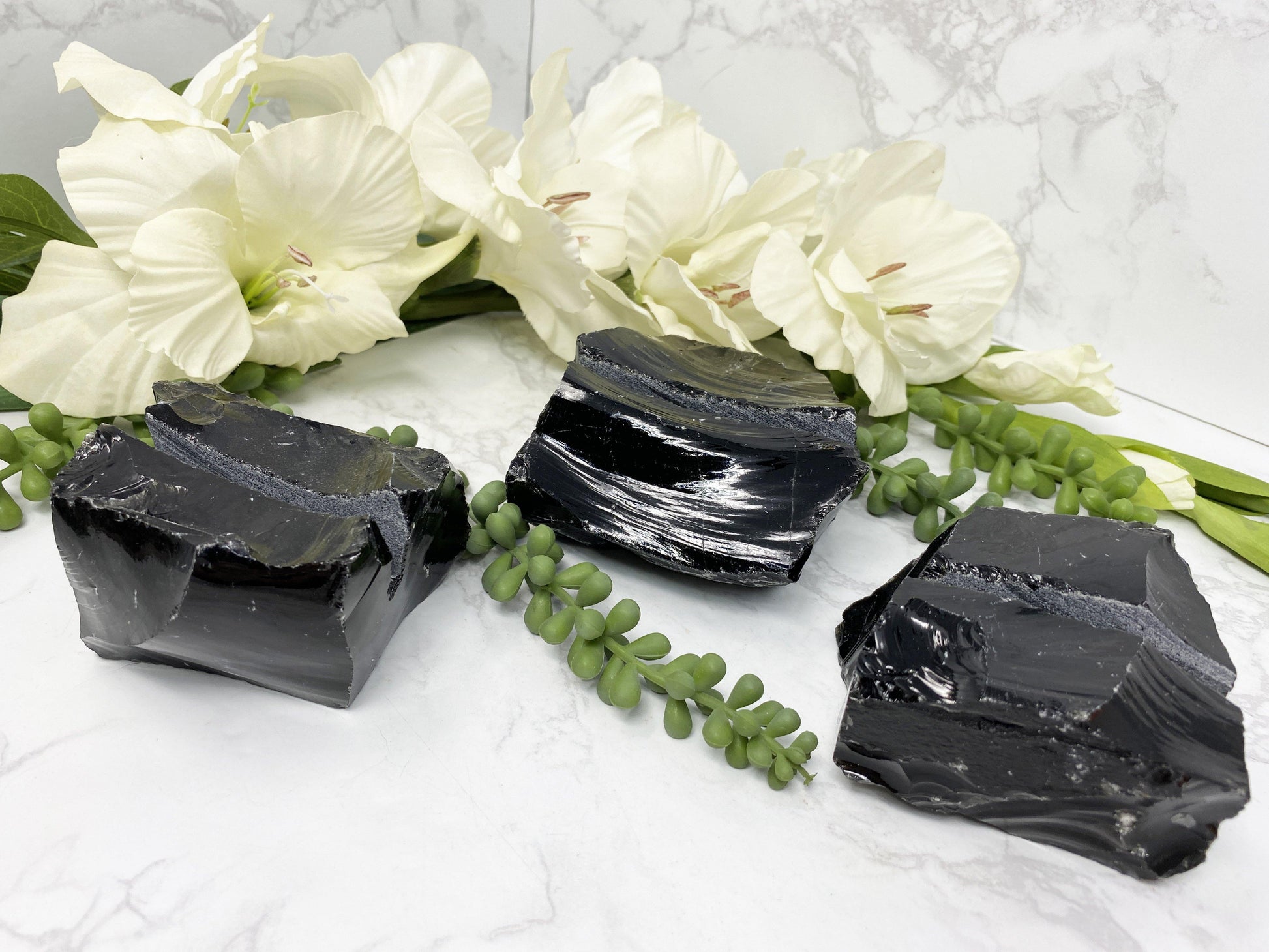 Raw Obsidian Crystal Business Card and Crystal Slice Holders from Contempo Crystals. Obsidian is a lava stone that is great at absorbing all things negative.