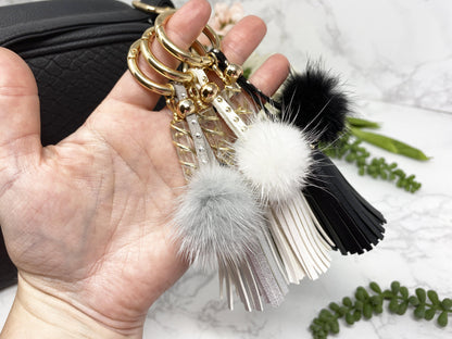 Carry your protective energies with you in style with this fashionable Quartz keychain! Made of vegan leather and vegan fur with little gold colored metal accents (gray has some silver accents)