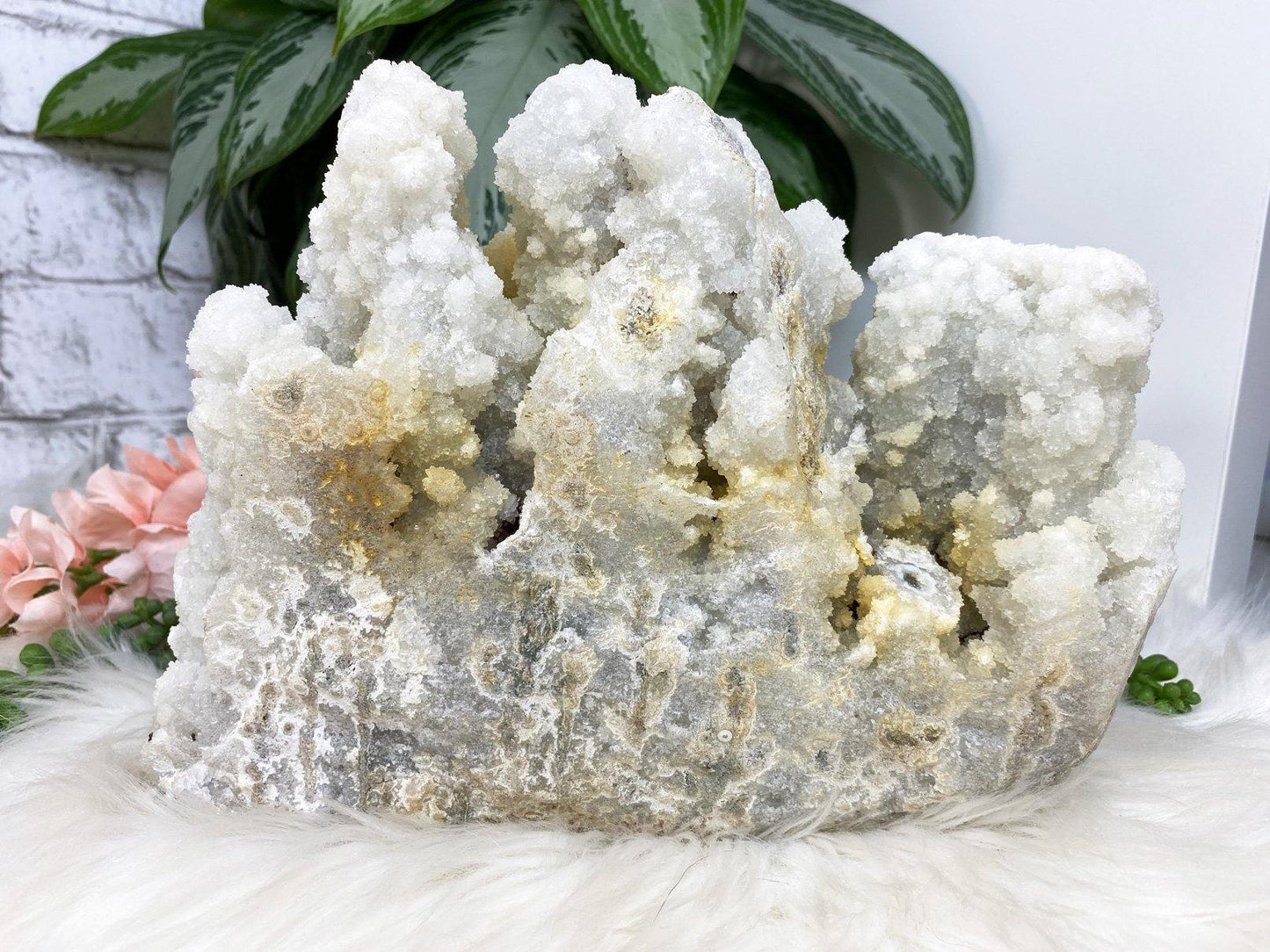 Large white apophyllite chalcedony crystal cluster with yellow iron