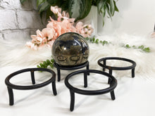 Load image into Gallery: Contempo Crystals - These simple black metal sphere stands are perfect for holding your favorite spheres or eggs.  - Image 5