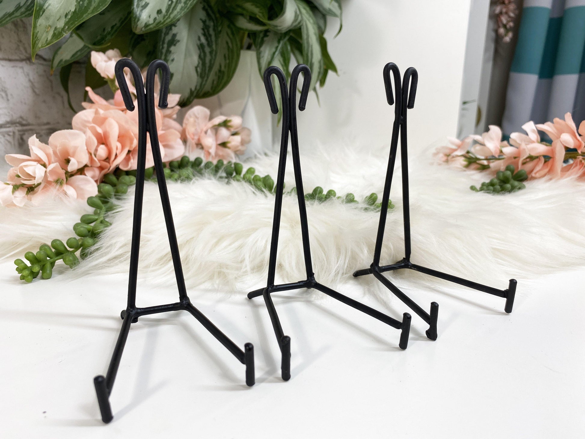 Easel metal display stands. These simple metal stands are perfect for propping up slabs or display crystals that usually just sit flat.