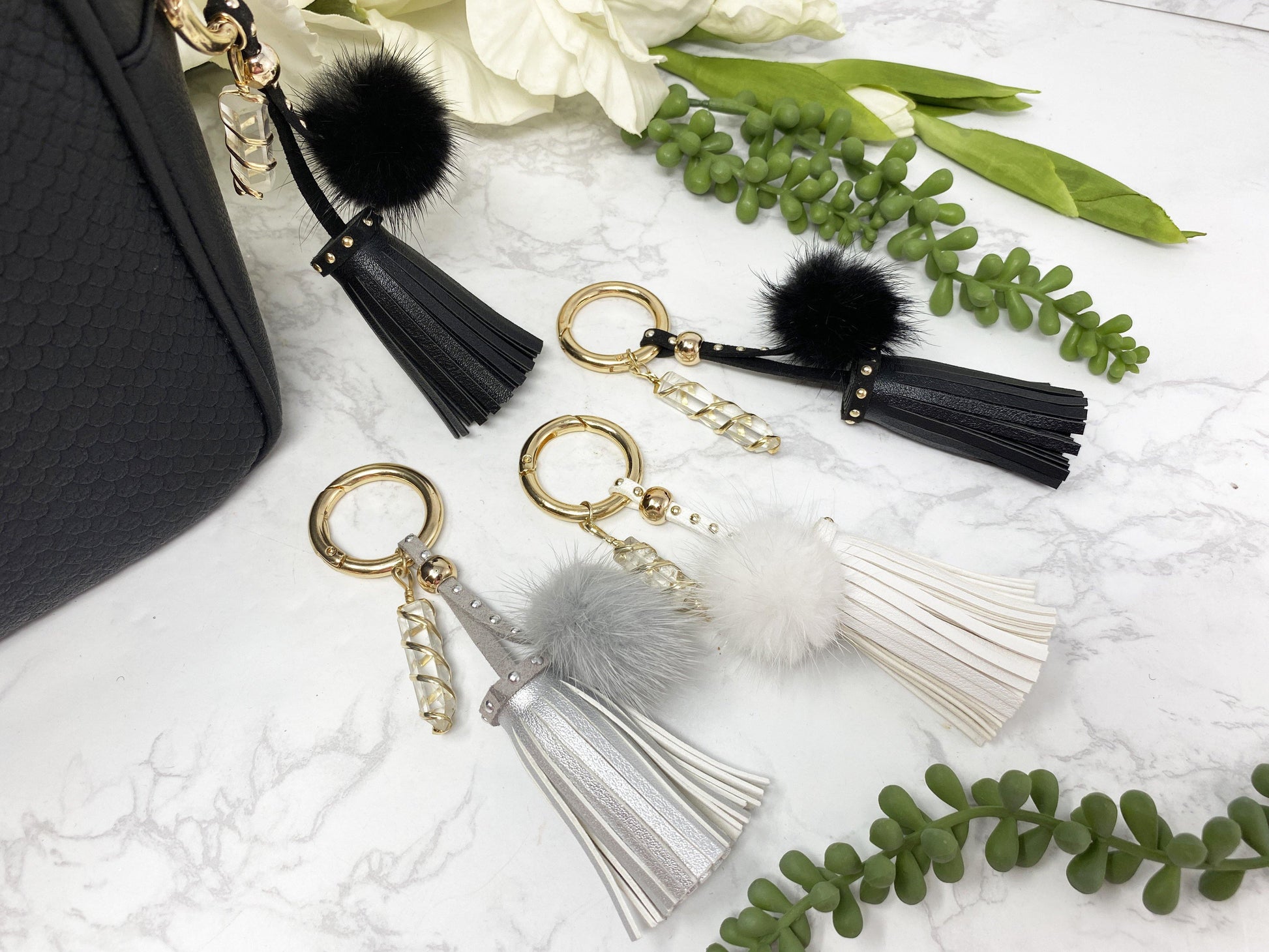 Carry your protective energies with you in style with this fashionable Quartz keychain! Made of vegan leather and vegan fur with little gold colored metal accents (gray has some silver accents)