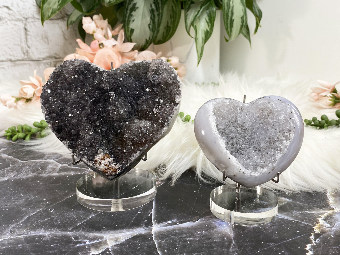 These simple acrylic and metal stands are perfect for showcasing your favorite pieces, especially ones that might sit a little wonky on the bottom.  They can also hold hearts that are about 2" in size and up