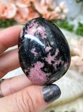 Load image into Gallery: Contempo Crystals - Madagascar-Black-Pink-Rhodonite-Worry-Stone - Image 5