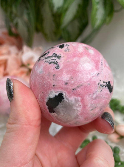 Pink-Rhodonite-Sphere-from-Peru