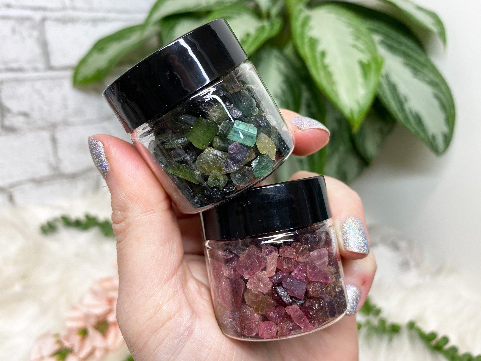 Raw pink green tourmaline crystals in gift jar