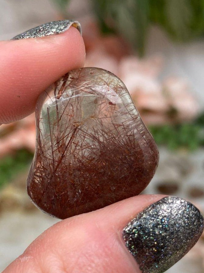 Tumbled-Red-Rutile-in-Clear-Quartz-Crystal