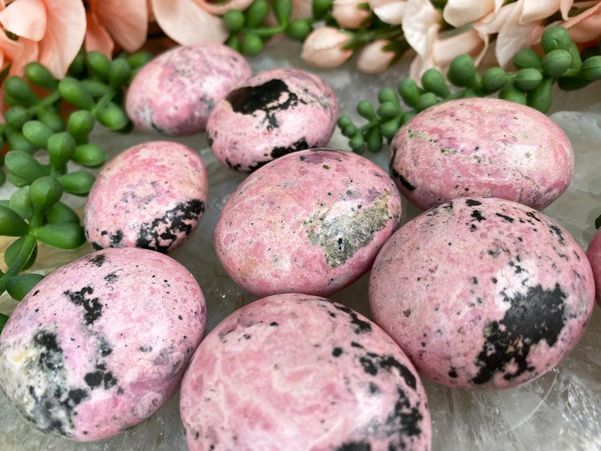 Rhodonite Pebbles - Pink & Black Rhodonite from Peru – Contempo Crystals