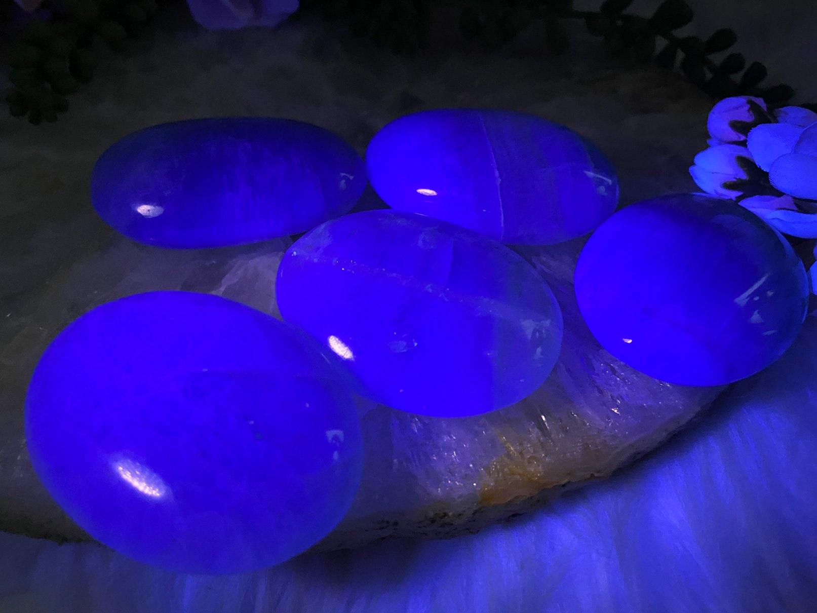 UV-Madagascar-Green-Fluorite-Palm-Stones-Glowing-Blue-Under-UV-Light