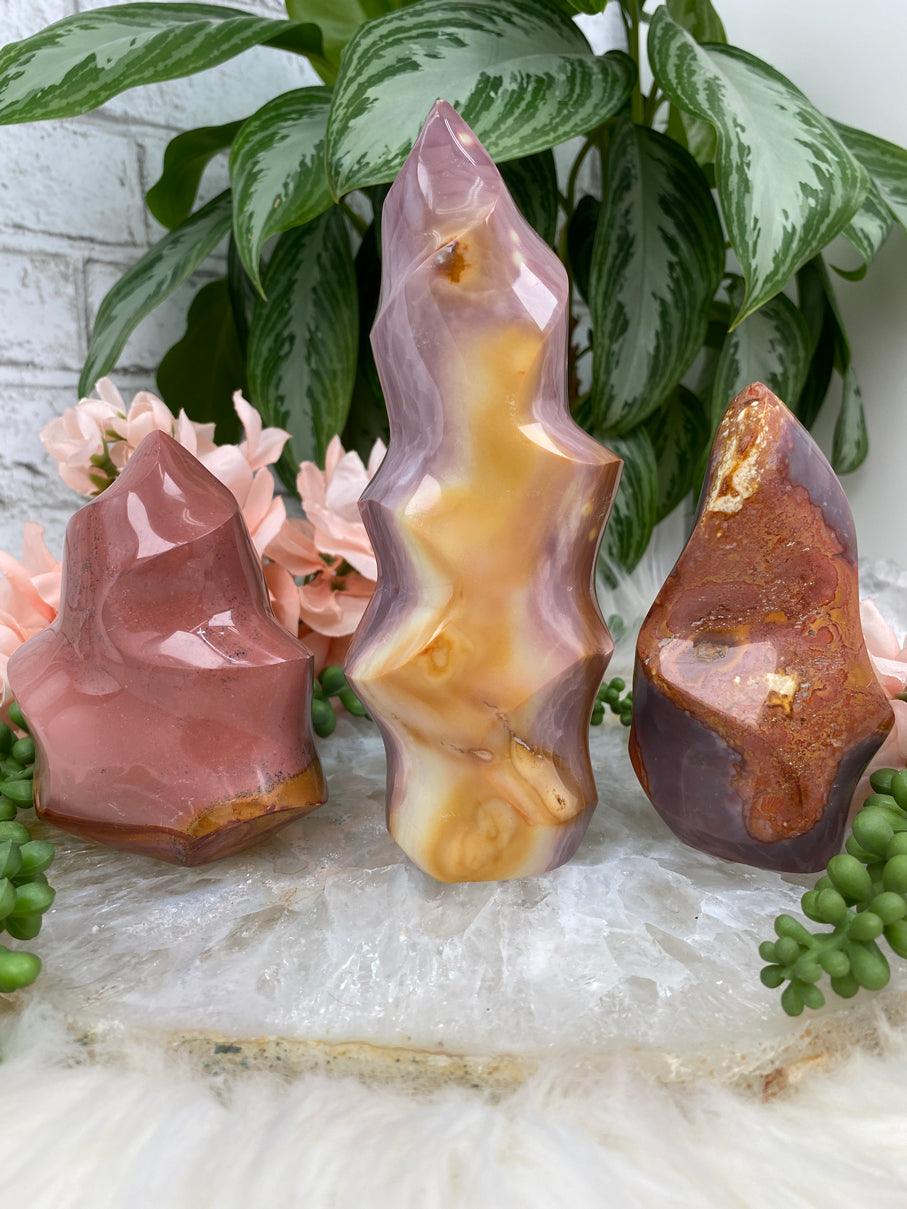 The top Pink Polychrome Jasper Yoni Flame