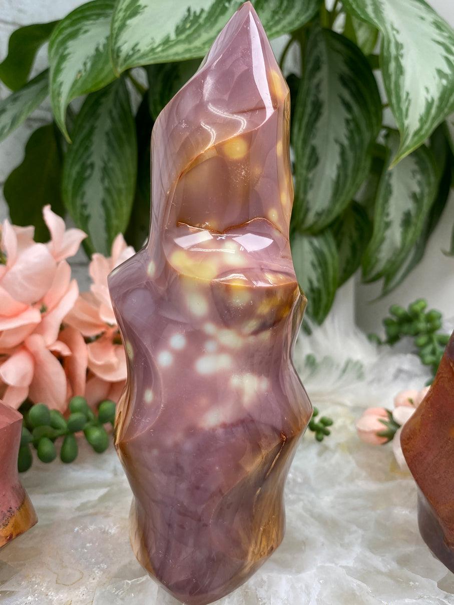 The top Pink Polychrome Jasper Yoni Flame