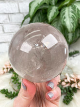 Load image into Gallery: Contempo Crystals - light-smoky-quartz-sphere - Image 5